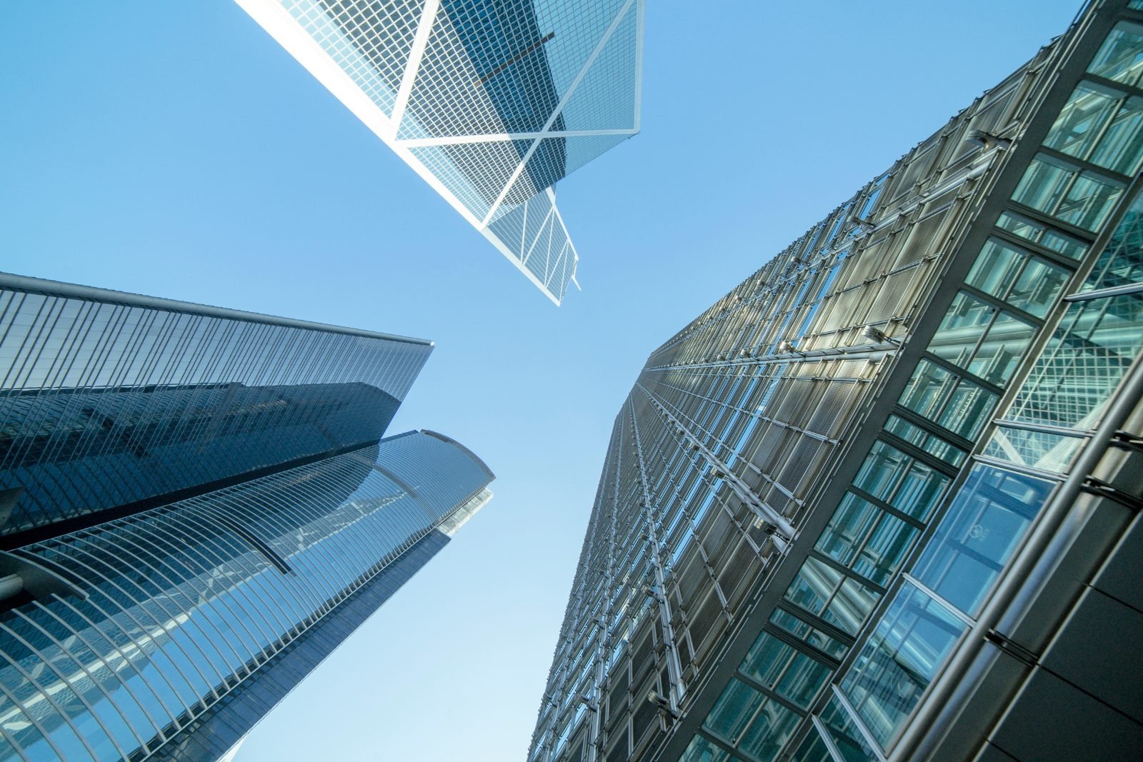Glass towers rising against a clear sky